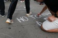 People write slogans on ground during demonstration independentist in Barcelona