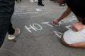 People write slogans on ground during demonstration independentist in Barcelona