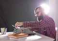 People, writer and hipster concept - young stylish writer working on typewriter Royalty Free Stock Photo