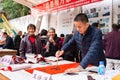People writing Chinese new year scrolls