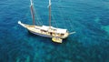 People on yacht, aerial sailing in Greece and summer sun on ocean holiday, relax in freedom and nature. Boat vacation Royalty Free Stock Photo