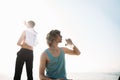 Yacht drinking beers while talking Group of friends having party on sailing boat Royalty Free Stock Photo