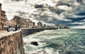 peoples fishing in malecon of havana