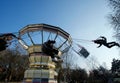 Peoples having fun with Carousel Amusement Park Ride at the Luna (MENEGHINO) Park in Milan - ITA -2023 March