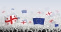 Peoples protest or cheering with flag of Georgia and European Union