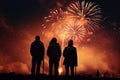 Peoples in silhouette enjoy watching amazing firework show in a festival or holiday Royalty Free Stock Photo