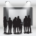 Peoples Silhouettes Looking on the Empty Frame in Art Gallery fo Royalty Free Stock Photo