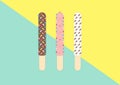 Pepero breadstick dipped chocolate with rainbow sparkles on pastel background