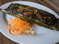 Pepes ikan bandeng is Indonesian traditional food, steam milkfish wrapped with banana leaf