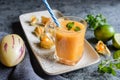 Pepino melon and golden berry smoothie in a glass jar