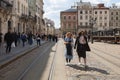Peple walking on Market (Rynok) Square in Lviv Ukraine