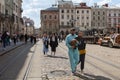 Peple walking on Market (Rynok) Square in Lviv Ukraine