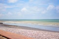 Peppel beach and teal ocean in Seine Maritime department in the Normandy region of northern France