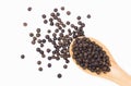 Black pepper seeds or peppercorns  dried seeds of piper nigrum Royalty Free Stock Photo