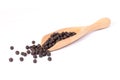 Black pepper seeds or peppercorns solated on white Royalty Free Stock Photo