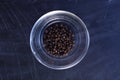 Pepper in bowl on black background Royalty Free Stock Photo