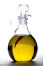 Pepper in cruet of olive oil.