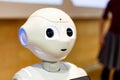 Pepper - the japanese semi humanoid robot assistant closeup on face / head, portrait . Artificial intelligence, modern robot