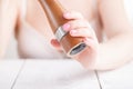 Pepper mill close up in female hands Royalty Free Stock Photo