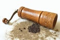 Pepper mill, peppercorn and grounded pepper Royalty Free Stock Photo