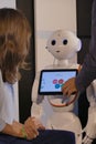 Pepper robot interact with bank customers