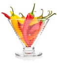 Pepper vegetable fruits in glass vase isolated