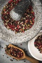 Peppercorn seed in granite mortar or pestle