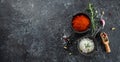 peppercorns and sea salt on a dark background, Long banner format. top view Royalty Free Stock Photo