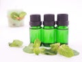 Peppermint aroma oil on white background