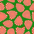 Peppermint candy finish guitar pick seamless pattern on green background. Concept for Christmas holiday wrapping paper Royalty Free Stock Photo