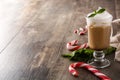 Peppermint coffee mocha for Christmas on wood Royalty Free Stock Photo