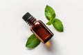 Peppermint Essential Oil In Small Brown Bottle Next To Peppermint On White Background, Top View. Generative AI