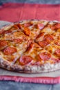 Pepperoni pizza closeup with selective focus Royalty Free Stock Photo