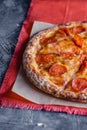 Pepperoni pizza closeup with selective focus Royalty Free Stock Photo