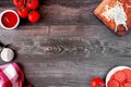 Pepperoni pizza ingredient frame on a wood table background Royalty Free Stock Photo