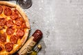 Pepperoni pizza with salami and cheese. On stone table. Royalty Free Stock Photo