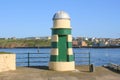 Pepperpot lighthouse at end of breakwater