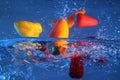 Peppers diving into water splashing Royalty Free Stock Photo