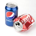 Coca Cola and Pepsi cans isolated on white background