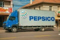 Pepsico brand painted on the side of a box truck