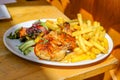 Per peri chicken with chips and salad Royalty Free Stock Photo