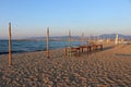 Peraia beach, suburb of Thessaloniki, Greece. View of a restaurant, tables and chairs, sunset time. Royalty Free Stock Photo