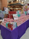 Displaying variety brands of Malaysian mooncakes food products on the shelf for sale at the supermarket.