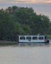 Perak,Malaysia,August 07 2020 - tourist river cruise at sunset Royalty Free Stock Photo