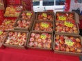 Plastic wrapped china tangerine or orange in boxes are displayed for sales
