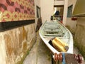 Perak, Malaysia-10 March 2021: The picture shows a boat stored in an empty space in the middle of the block.