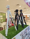 Various type of big and small photography tripods on displayed and sale at N4 Camera stor Royalty Free Stock Photo