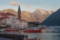 Perast, Montenegro - June 15, 2016: Harbor of a small seaside town at sunset. Royalty Free Stock Photo