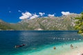 Perast in hte Bay of Kotor with views on the rising mountains and the church of the lady of the Rocks