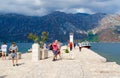 Tourists visit Gospa od Skrpela Island in Bay of Kotor, Montenegro Royalty Free Stock Photo